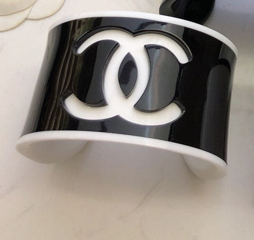 Black and white Chanel logo on a product