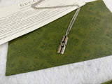 Double G Knot Pendant Necklace