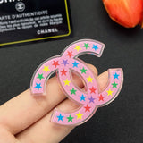 18K CC Pink & Black Star Brooch