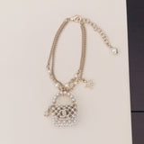 18K CHANEL Bag Pendant Pearl Bracelet