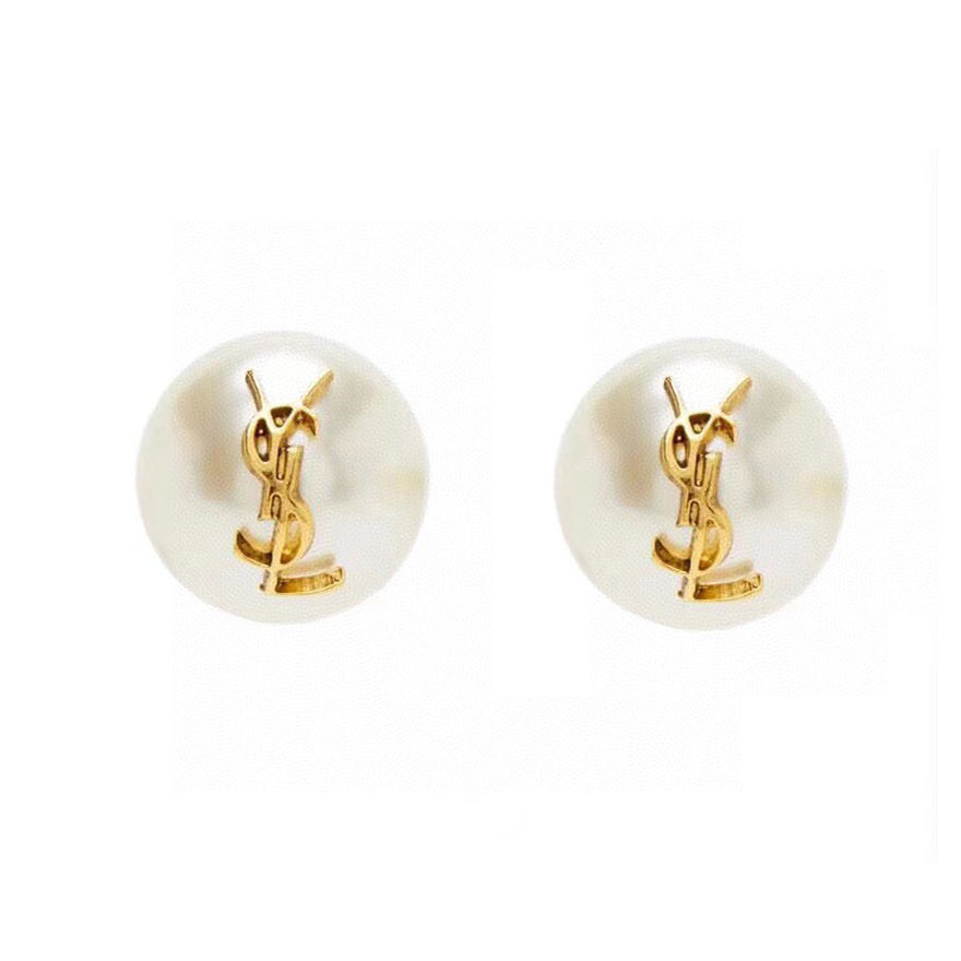 Pair of pearl earrings with gold logo on a white background