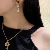 18K CC Camellia Red Crystal Earrings