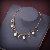 18K Double G Logo Plaque Embellished Pearl Necklace