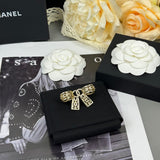 18K CC 25K Bow Tie Diamond Gold Brooch